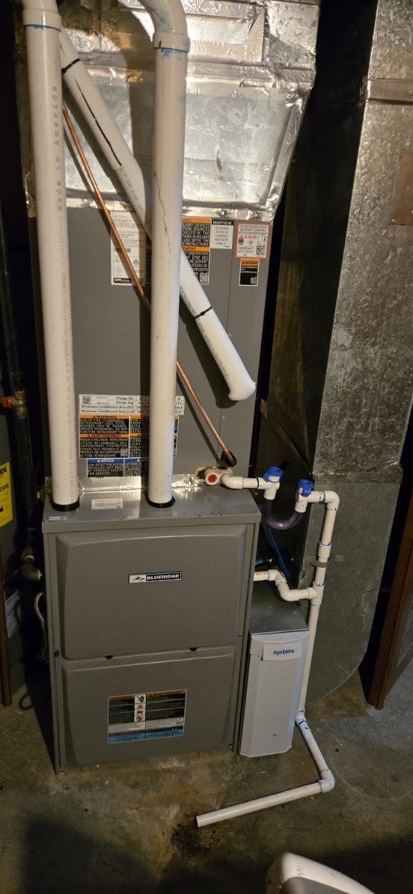 Furnace with whole-home humidifier